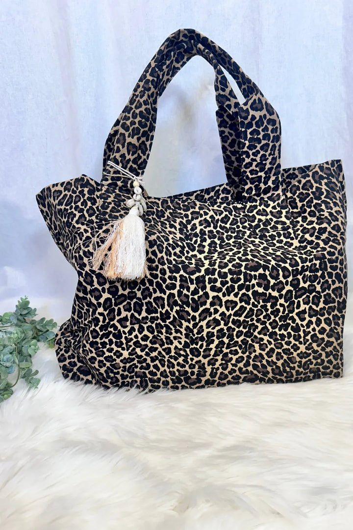 Iso leopardikuvioinen kangaslaukku