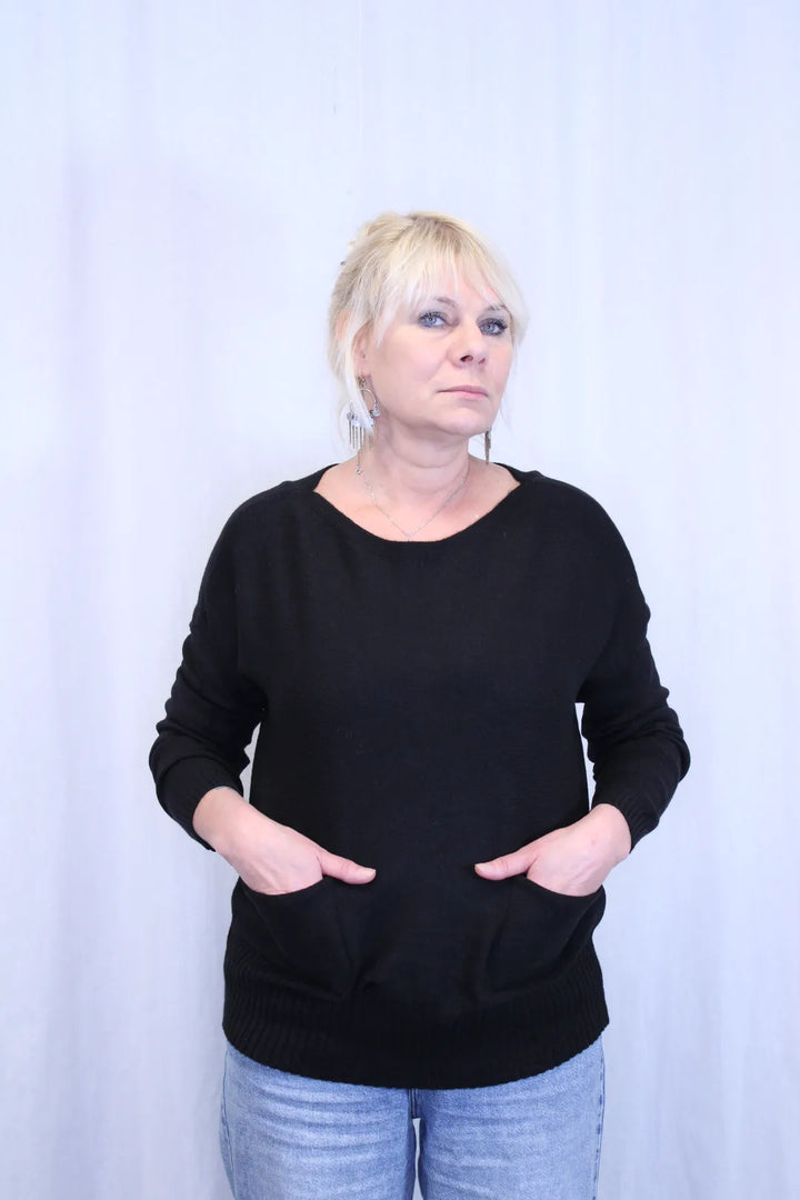 Neule taskuilla Auni