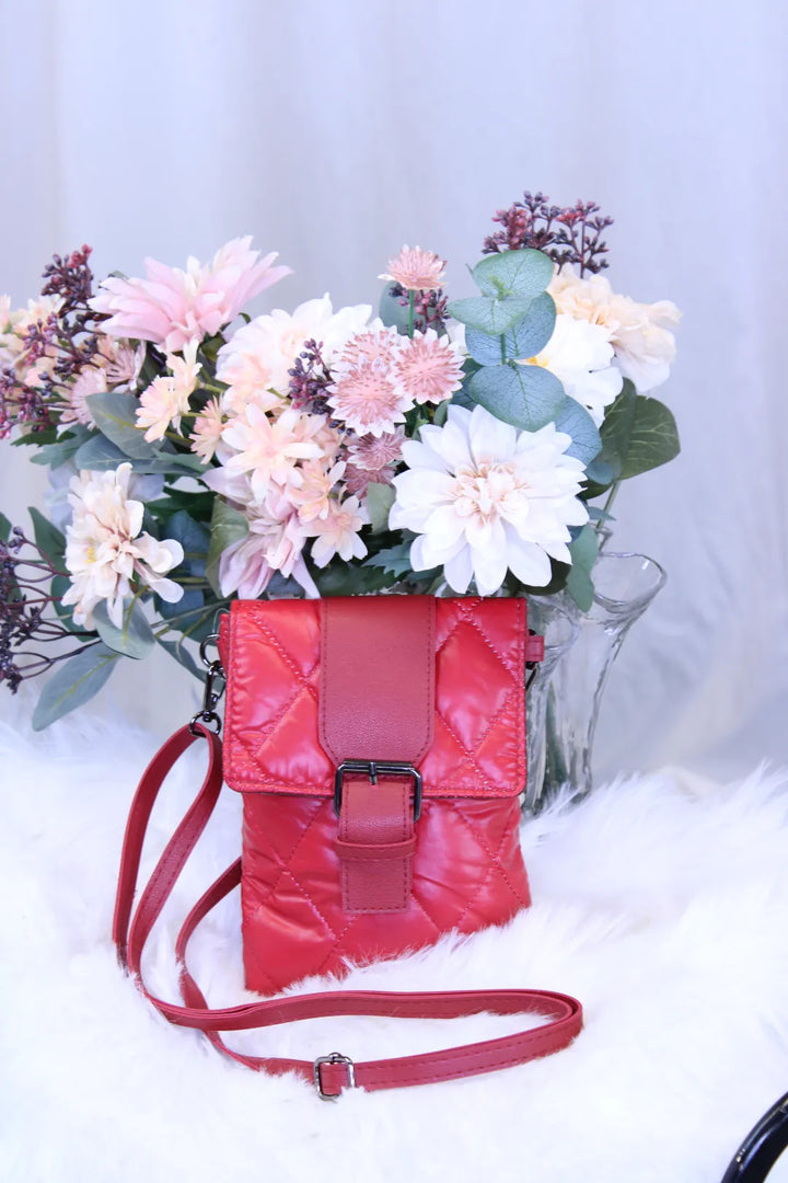 Pieni tikattu olkalaukku