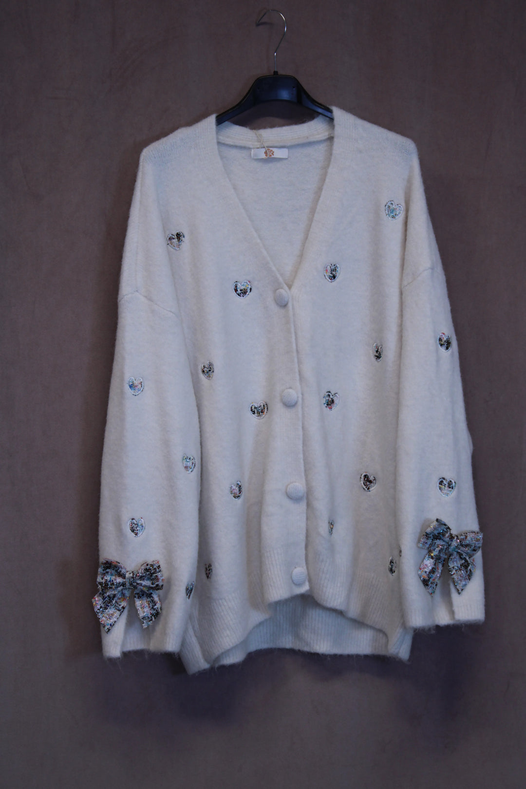 Neuletakki sydämillä Hellä