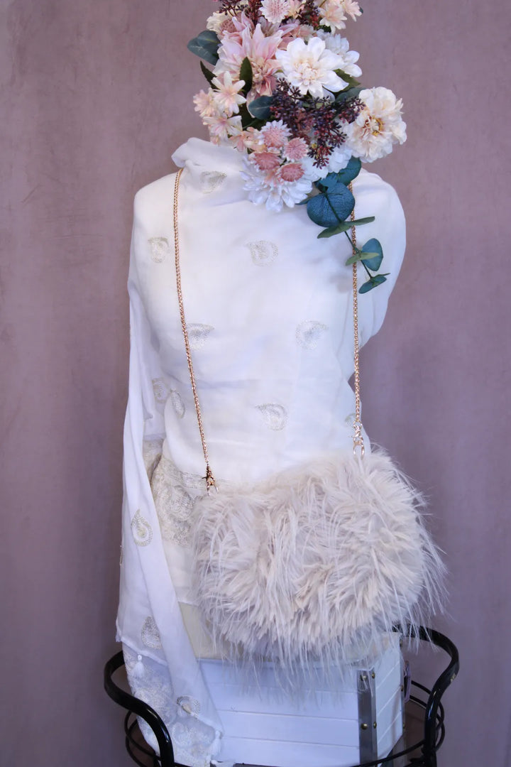 Tekoturkislaukku Lumi