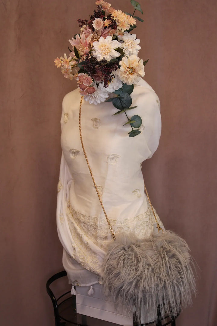 Tekoturkislaukku Lumi