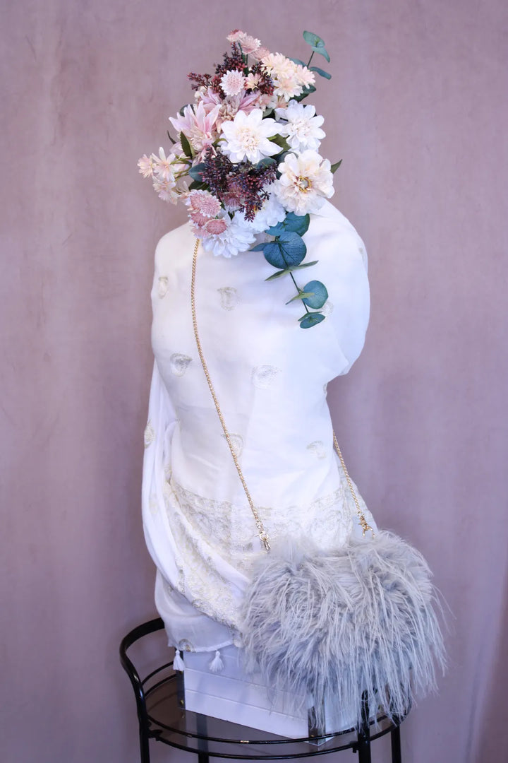 Tekoturkislaukku Lumi