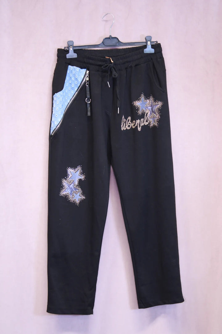 Collegehousut tähtikoristeilla Inka