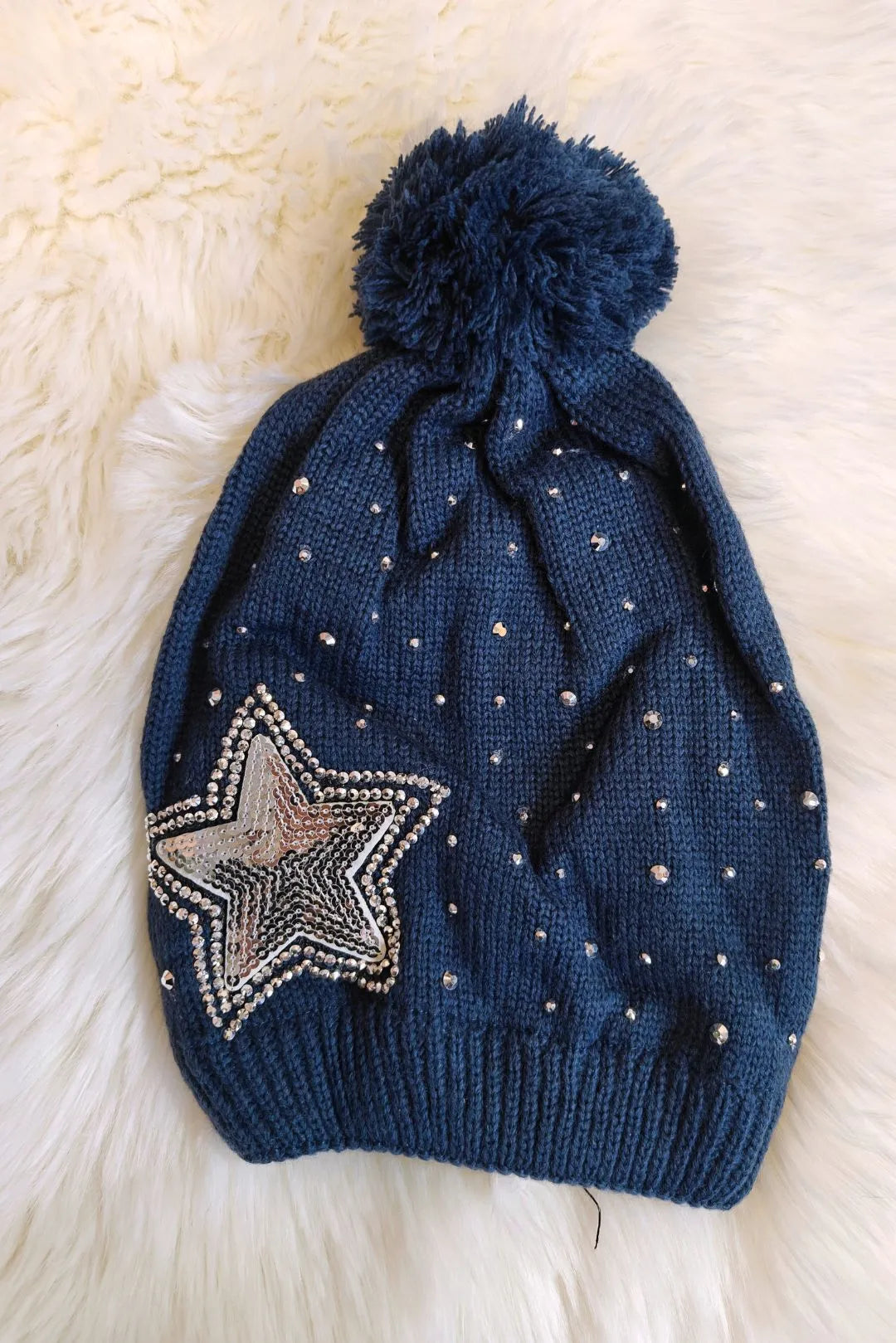 Tähtipipo tupsulla Nella