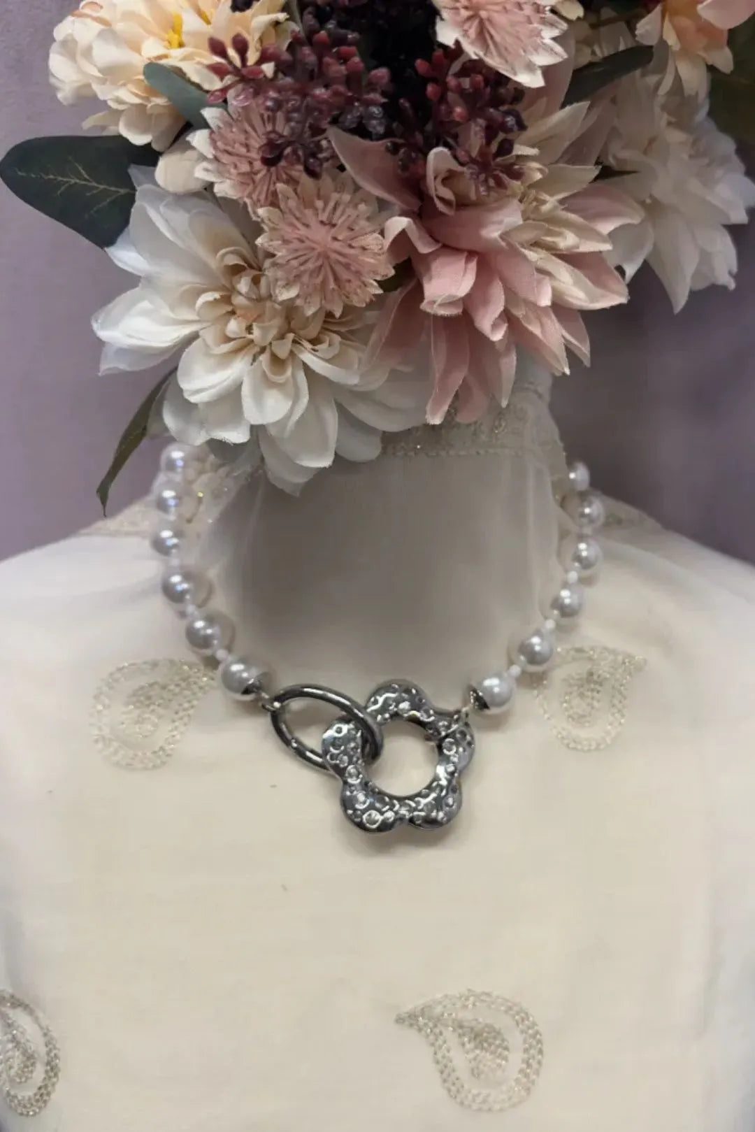 Helmikaulakoru Sinna