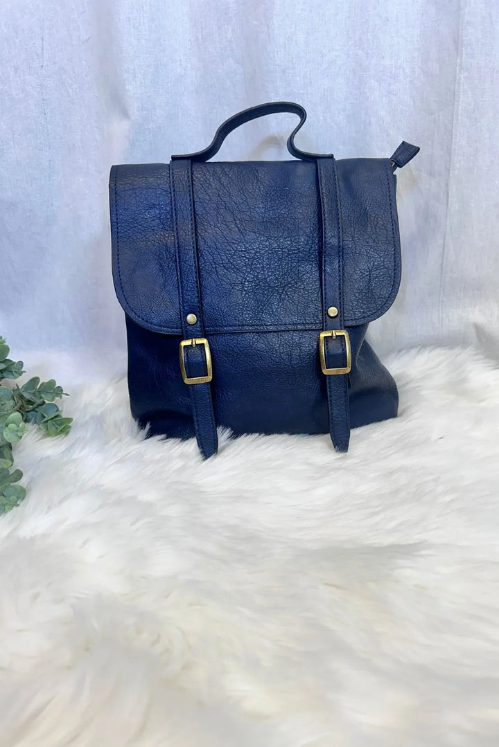 Keinonahkainen solkireppu