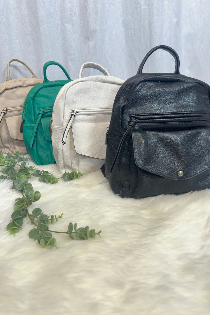 Keinonahkareppu pikkutaskuilla