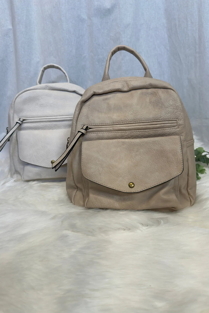 Keinonahkareppu pikkutaskuilla