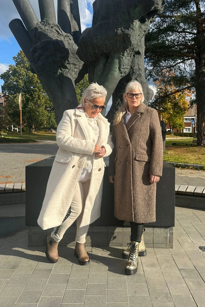 Pitkä kangastakki Tuomi