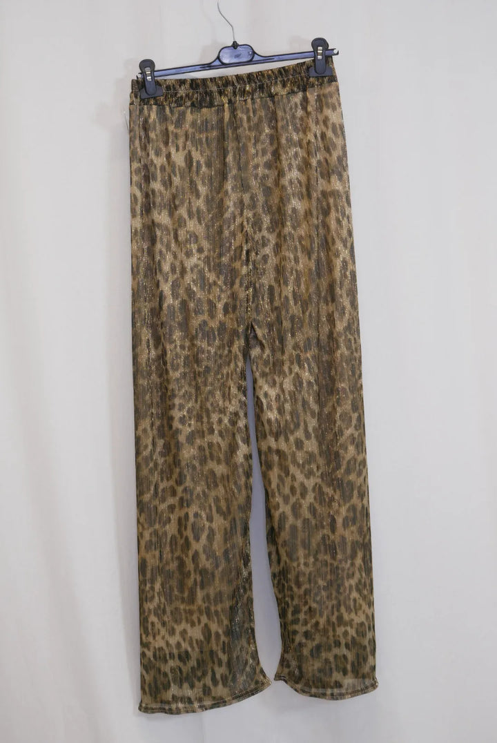 Kimaltavat housut leopardikuosilla