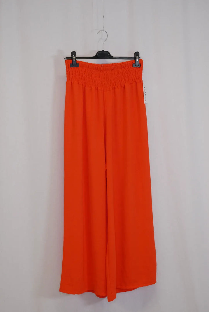 Leveälahkeiset housut Janita