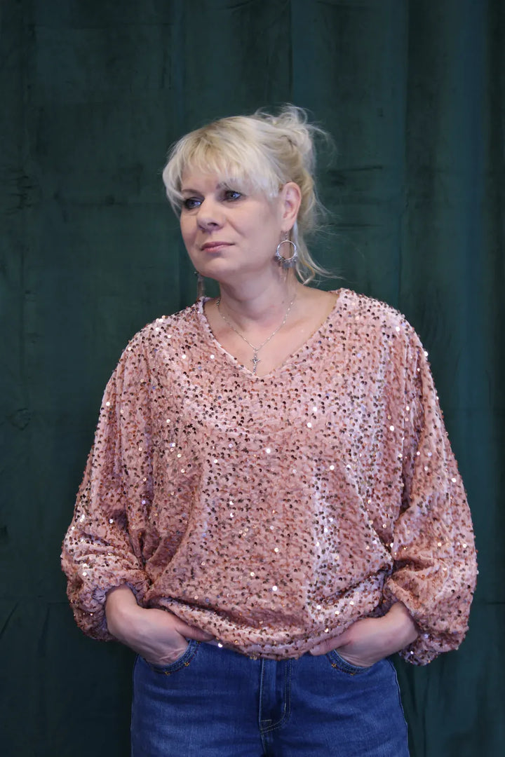 Paljettipaita lepakkohihoilla